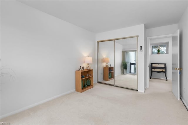 3934 Whispering Oaks Pl, Virginia Beach, VA 23455 - unfurnished bedroom with carpet flooring, a closet, and baseboards