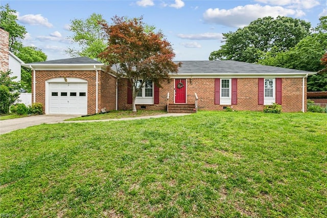 118 Cove Rd, Newport News, VA 23608 - ranch-style house featuring an attached garage, driveway, and brick siding