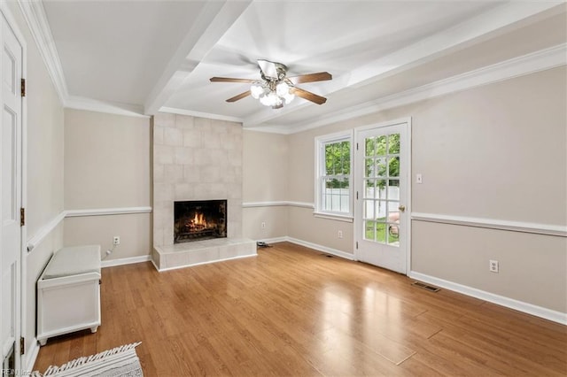 118 Cove Rd, Newport News, VA 23608 - unfurnished living room with ornamental molding, a ceiling fan, a fireplace, wood finished floors, and baseboards