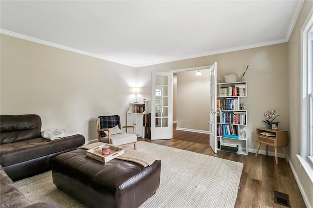 118 Cove Rd, Newport News, VA 23608 - living area featuring french doors, wood finished floors, ornamental molding, and baseboards