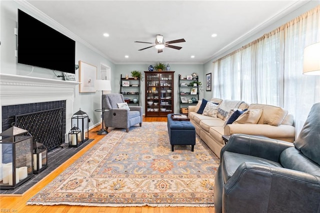 1808 Ashley Dr, Virginia Beach, VA 23454 - living area featuring a ceiling fan, wood finished floors, recessed lighting, ornamental molding, and a fireplace with flush hearth