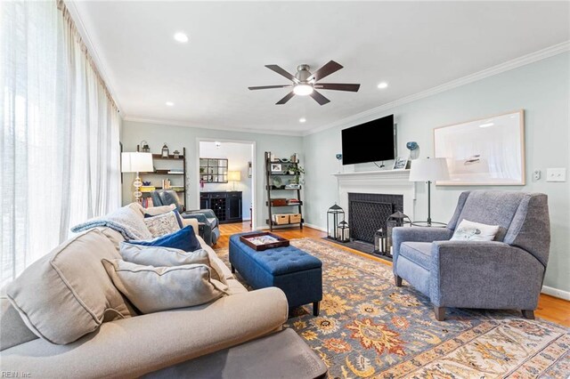 1808 Ashley Dr, Virginia Beach, VA 23454 - living area featuring wood finished floors, crown molding, a ceiling fan, a fireplace with flush hearth, and recessed lighting