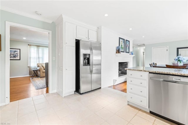 1808 Ashley Dr, Virginia Beach, VA 23454 - kitchen featuring stainless steel appliances, a fireplace, white cabinetry, recessed lighting, and crown molding