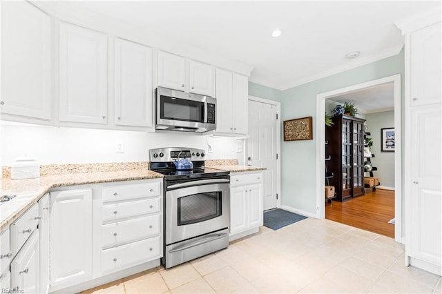 1808 Ashley Dr, Virginia Beach, VA 23454 - kitchen featuring stainless steel appliances, white cabinets, ornamental molding, light stone counters, and recessed lighting