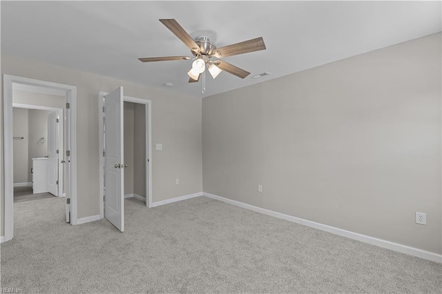 2905 Roanoke Ave, Newport News, VA 23607 - unfurnished bedroom with light colored carpet, baseboards, and a ceiling fan