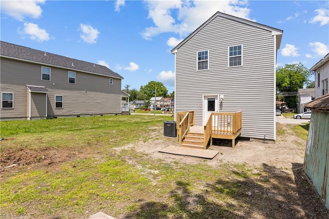 2905 Roanoke Ave, Newport News, VA 23607 - back of property with cooling unit, a wooden deck, and a lawn