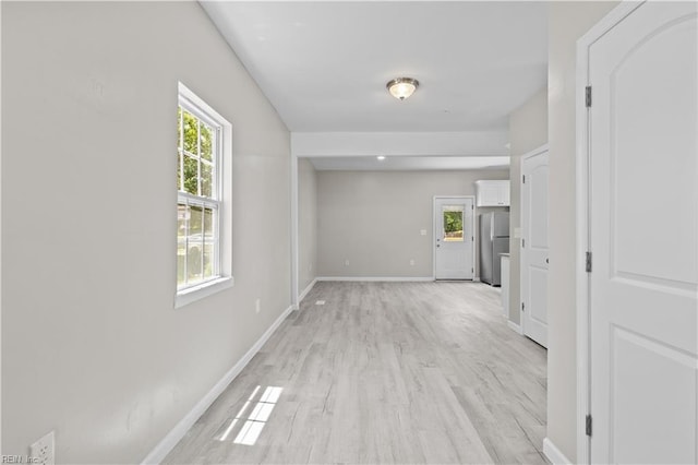 2905 Roanoke Ave, Newport News, VA 23607 - empty room featuring light wood-style floors and baseboards