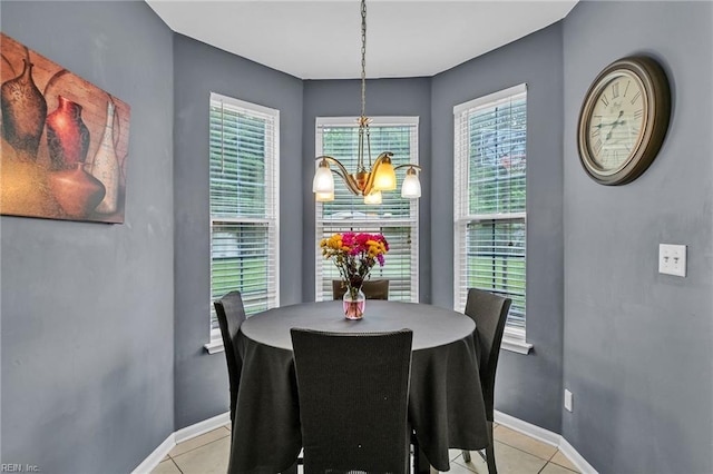 111 Windsor Ct, Suffolk, VA 23434 - dining area with a chandelier, baseboards, and light tile patterned floors