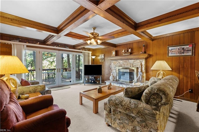 2300 Broad Bay Rd, Virginia Beach, VA 23451 - carpeted living room with beamed ceiling, ceiling fan, wooden walls, a stone fireplace, and coffered ceiling
