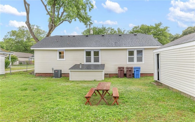 1006 Mayfield Ave, Chesapeake, VA 23324 - rear view of house featuring central air condition unit, a shingled roof, and crawl space