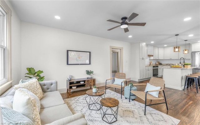 1006 Mayfield Ave, Chesapeake, VA 23324 - living area featuring recessed lighting, a ceiling fan, dark wood finished floors, and baseboards