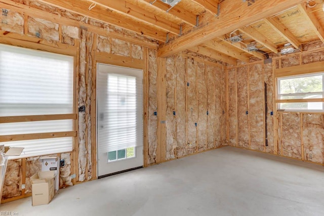 65 Maple Ave, Newport News, VA 23607 - interior space with healthy amount of natural light and concrete flooring