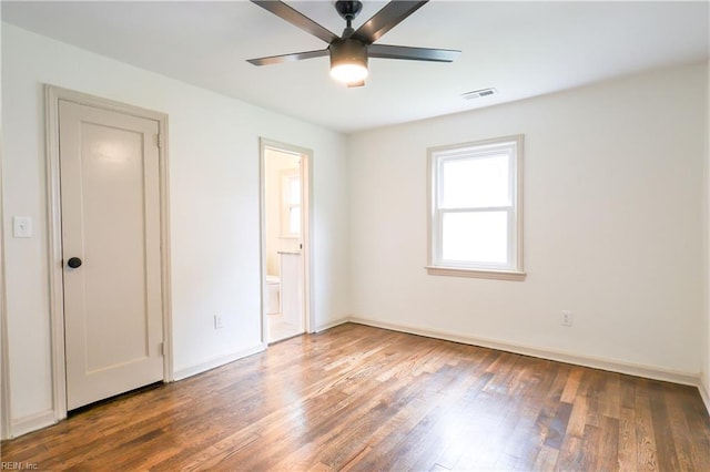 8014 E Glen Rd, Norfolk, VA 23505 - unfurnished bedroom featuring wood finished floors, baseboards, ensuite bathroom, and a ceiling fan