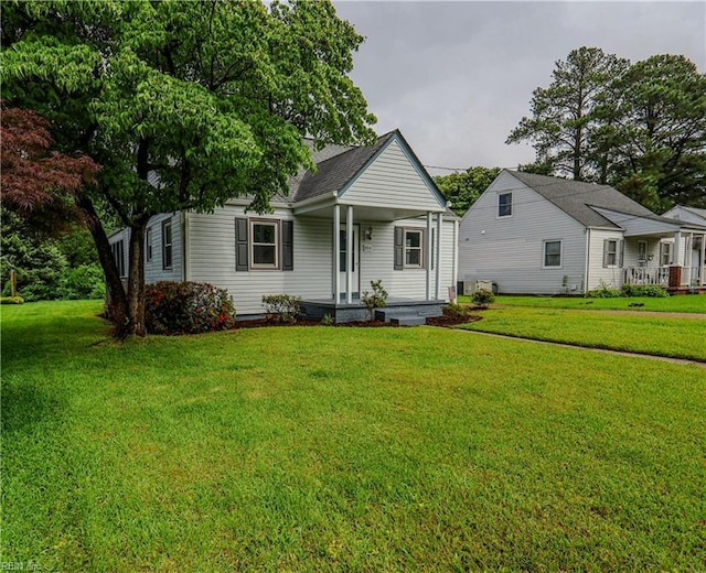 8014 E Glen Rd, Norfolk, VA 23505 - bungalow with covered porch and a front yard