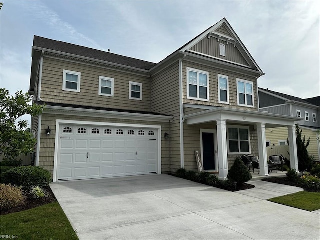 1922 Briton Ln, Chesapeake, VA 23322 - view of front of property featuring concrete driveway, a garage, and covered porch