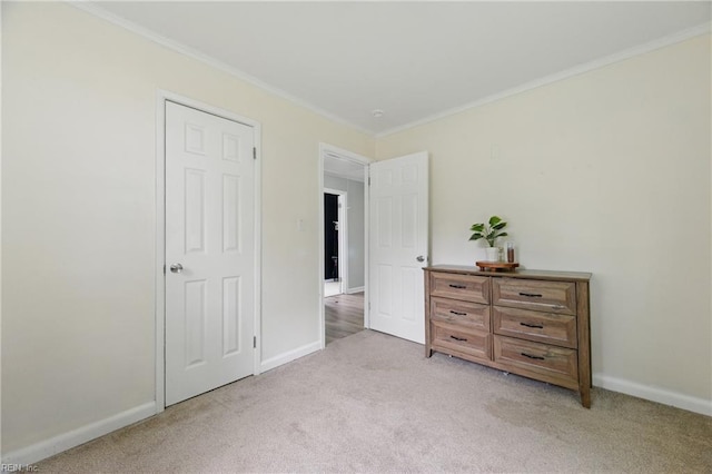 400 Cedar Dr, Hampton, VA 23669 - bedroom with light colored carpet, crown molding, and baseboards