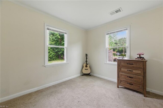 400 Cedar Dr, Hampton, VA 23669 - bedroom featuring multiple windows, crown molding, light carpet, and baseboards