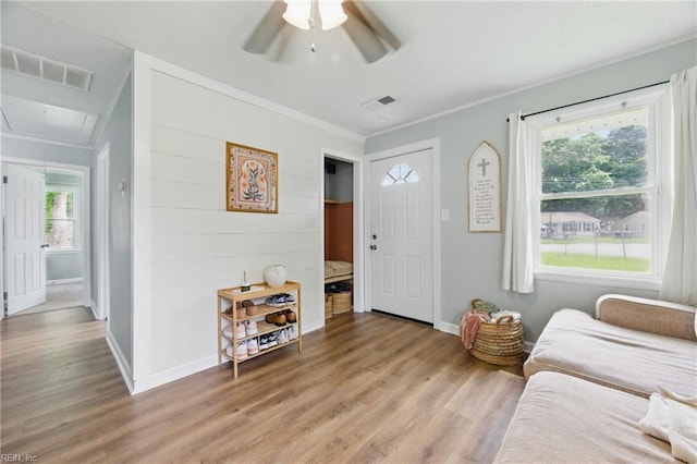 400 Cedar Dr, Hampton, VA 23669 - foyer entrance with a ceiling fan, light wood-style floors, baseboards, and crown molding