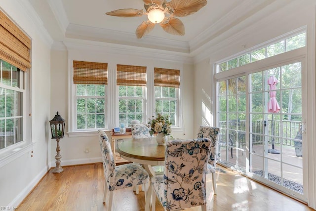 102 Ships Lndg, Carrollton, VA 23314 - dining space with light wood-style flooring, crown molding, a raised ceiling, baseboards, and ceiling fan