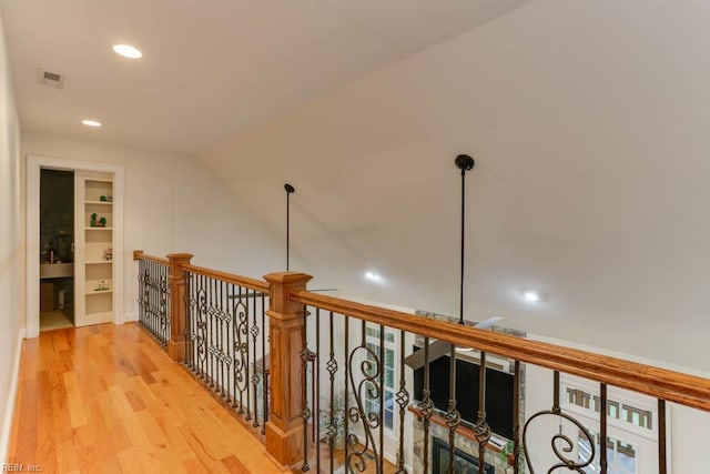 102 Ships Lndg, Carrollton, VA 23314 - corridor featuring wood finished floors, recessed lighting, and an upstairs landing