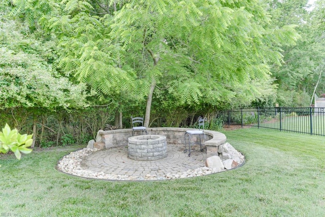 102 Ships Lndg, Carrollton, VA 23314 - view of yard with a fire pit and a patio area