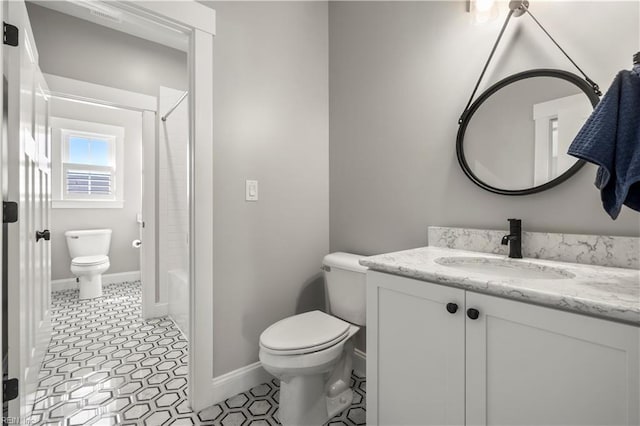 3527 Glencoe Ct, Chesapeake, VA 23322 - bathroom with toilet, vanity, baseboards, and shower / tub combo