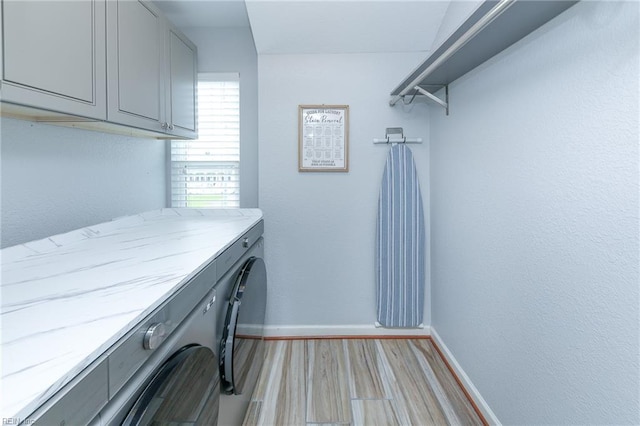 1920 Flintshire Dr, Chesapeake, VA 23323 - washroom featuring cabinet space, washer and clothes dryer, baseboards, and light wood finished floors