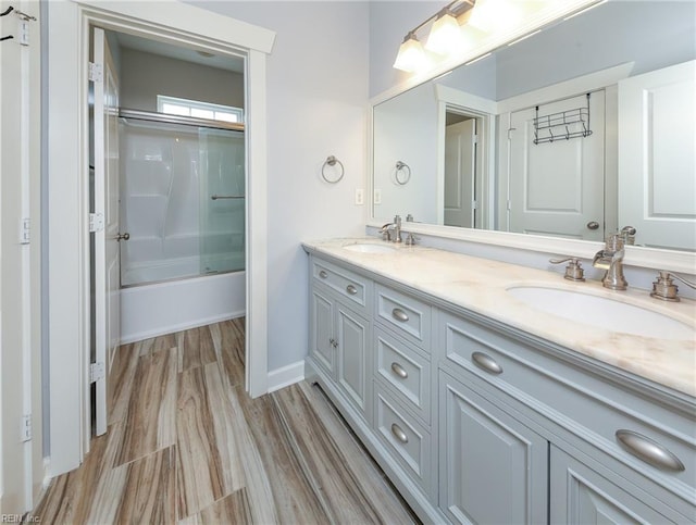 1920 Flintshire Dr, Chesapeake, VA 23323 - full bath with double vanity, shower / bath combination with glass door, and baseboards