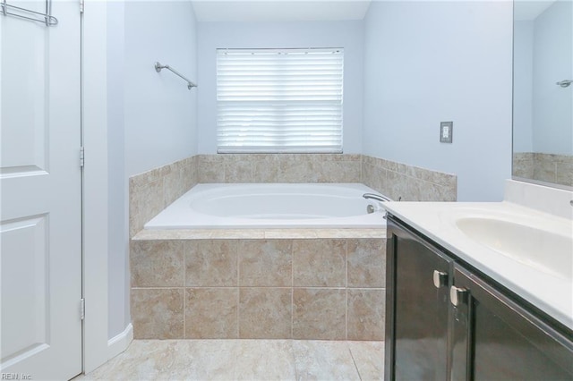 1920 Flintshire Dr, Chesapeake, VA 23323 - bathroom with a garden tub, vanity, and tile patterned flooring