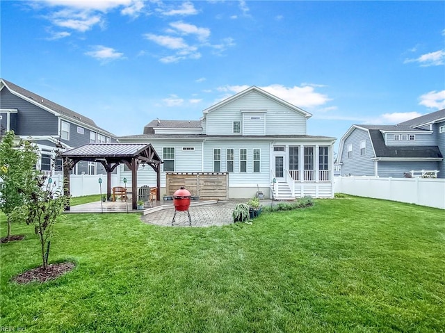 1920 Flintshire Dr, Chesapeake, VA 23323 - back of property with a gazebo, a patio, and a sunroom