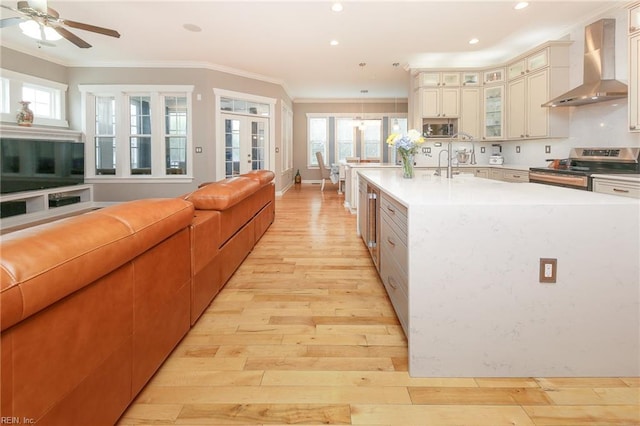 1920 Flintshire Dr, Chesapeake, VA 23323 - kitchen with wall chimney range hood, appliances with stainless steel finishes, ornamental molding, light wood-style floors, and open floor plan