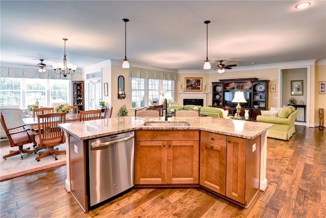 3907 Ethan Ln, Williamsburg, VA 23188 - kitchen with stainless steel dishwasher, a sink, ceiling fan, open floor plan, and crown molding