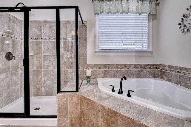 3907 Ethan Ln, Williamsburg, VA 23188 - full bath with a garden tub, a shower stall, and healthy amount of natural light