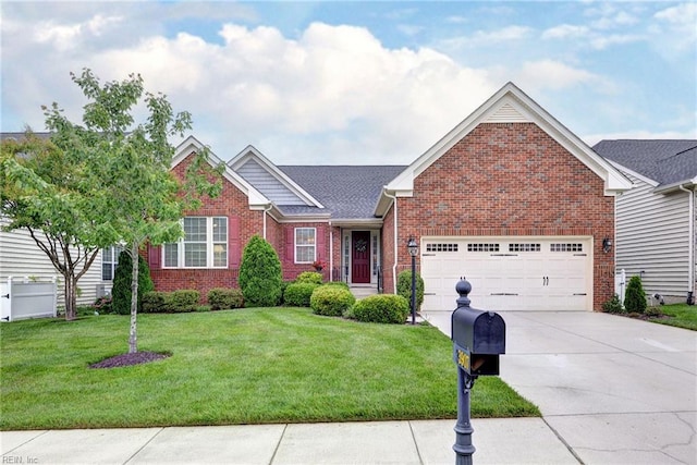 3907 Ethan Ln, Williamsburg, VA 23188 - view of front facade featuring brick siding, driveway, a front lawn, and a garage