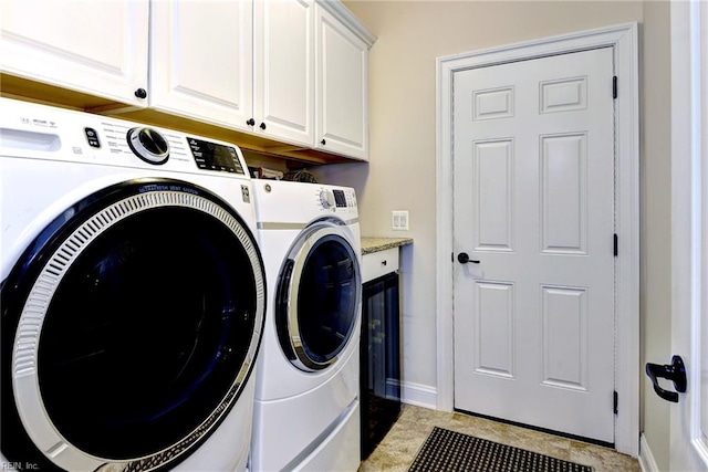 3907 Ethan Ln, Williamsburg, VA 23188 - washroom with washer and dryer, cabinet space, and baseboards