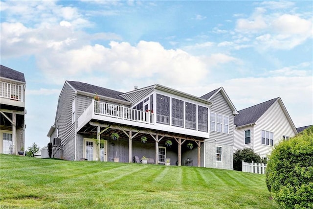 3907 Ethan Ln, Williamsburg, VA 23188 - back of property featuring a wooden deck and a sunroom