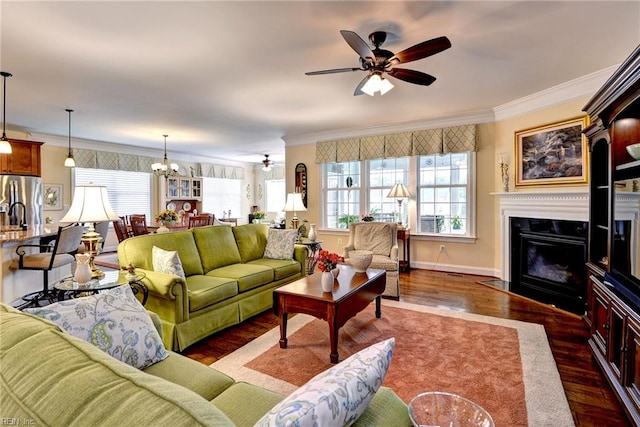 3907 Ethan Ln, Williamsburg, VA 23188 - living area featuring a ceiling fan, ornamental molding, wood finished floors, a fireplace with flush hearth, and baseboards