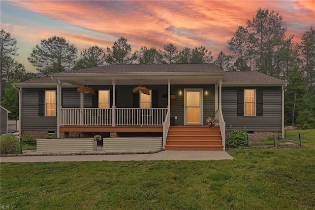 320 Pamunkey Ridge Rd, King William, VA 23086 - view of front facade featuring a porch, a front lawn, and crawl space
