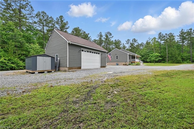 320 Pamunkey Ridge Rd, King William, VA 23086 - detached garage featuring a shed