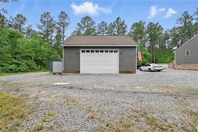 320 Pamunkey Ridge Rd, King William, VA 23086 - detached garage with a storage shed