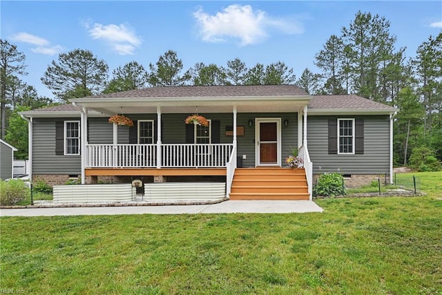 320 Pamunkey Ridge Rd, King William, VA 23086 - view of front of house featuring a porch, crawl space, and a front yard