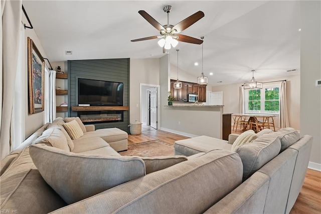 320 Pamunkey Ridge Rd, King William, VA 23086 - living area featuring light wood-style flooring, baseboards, ceiling fan, vaulted ceiling, and recessed lighting