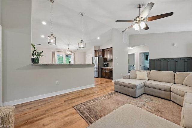 320 Pamunkey Ridge Rd, King William, VA 23086 - living area with vaulted ceiling, light wood finished floors, baseboards, a ceiling fan, and recessed lighting