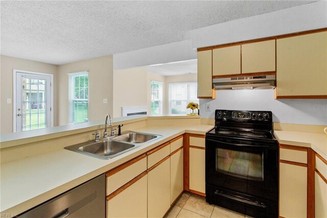 5113 Thatcher Way, Virginia Beach, VA 23456 - kitchen with under cabinet range hood, black / electric stove, a sink, stainless steel dishwasher, and light countertops