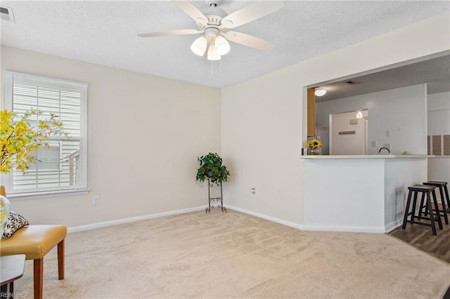 5113 Thatcher Way, Virginia Beach, VA 23456 - living area with ceiling fan, a textured ceiling, carpet flooring, and baseboards