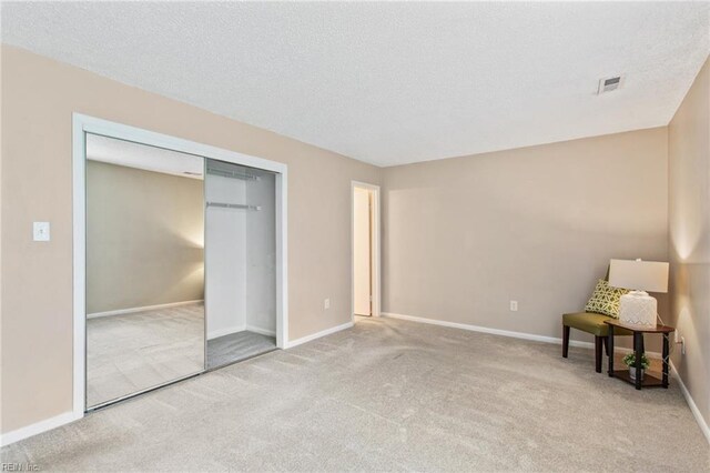 5113 Thatcher Way, Virginia Beach, VA 23456 - unfurnished bedroom with carpet floors, baseboards, a closet, and a textured ceiling