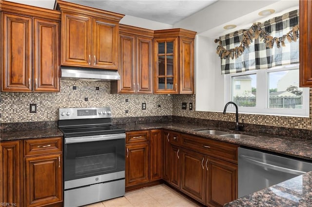 401 Fire Box Ct, Chesapeake, VA 23323 - kitchen with appliances with stainless steel finishes, ventilation hood, a sink, tasteful backsplash, and dark stone counters
