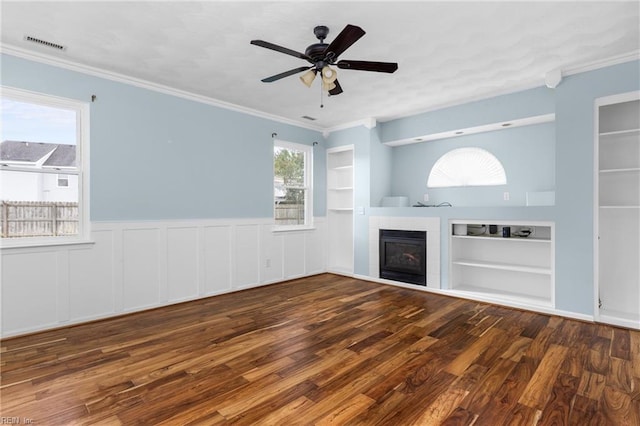 401 Fire Box Ct, Chesapeake, VA 23323 - unfurnished living room featuring built in shelves, wood finished floors, a fireplace, a ceiling fan, and ornamental molding