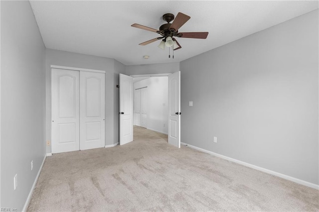 401 Fire Box Ct, Chesapeake, VA 23323 - unfurnished bedroom featuring baseboards, light colored carpet, a closet, and ceiling fan