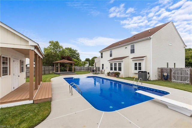 401 Fire Box Ct, Chesapeake, VA 23323 - view of swimming pool with a gazebo, a deck, central AC, a diving board, and a patio area